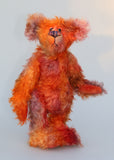 Chipotle is a wild and fiery, yet still very friendly, one of a kind artist bear in beautiful hand dyed mohair by Barbara-Ann Bears Chipotle stands 11 inches(28 cm) tall and is 8 inches (21 cm) sitting. Chipotle is a wild and shaggy chap, a bear who loves to walk across the hottest deserts, to be alone under the fiercest sun