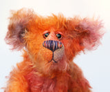 Chipotle is a wild and fiery, yet still very friendly, one of a kind artist bear in beautiful hand dyed mohair by Barbara-Ann Bears Chipotle stands 11 inches(28 cm) tall and is 8 inches (21 cm) sitting. Chipotle is a wild and shaggy chap, a bear who loves to walk across the hottest deserts, to be alone under the fiercest sun