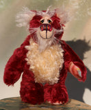 Christoff is a very cuddly and jolly one of a kind, red and cream mohair artist teddy bear by Barbara-Ann Bears who is full of love Christoff stands 10 inches( 25 cm) tall and is 7.5 inches (19 cm) sitting. Christoff is ready for a cuddle, well he's always ready for a cuddle, it's what he loves most!