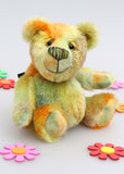 Chumley is an extremely lovable, sweet and happy one of a kind artist bear made from beautiful hand dyed mohair by Barbara Ann Bears Chumley stands just 8 inches (20 cm) tall and is 6 inches (15cm) sitting. He is made from a fairly short, straight pile mohair that Barbara has hand-dyed in a combination of spring colours