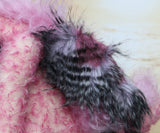 Clarissa The Candyfloss Mountain Dragon a wild yet calm and feminine fluffy pink dragon in gorgeous mohair and faux fur by Barbara Ann Bears, she stands 15 inches( 38 cm) tall and is 11.5 inches (29 cm) sitting. She is about 20 inches (50cm) from nose to tail and has a wingspan of 16 inches (40cm).