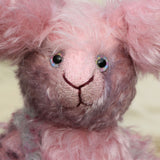 Clover Blossom is a very sweet and gentle, one of a kind rabbit in beautifully coloured mohair by Barbara Ann Bears Clover Blossom stands 9.5 inches( 24 cm) tall and is 7 inches (18cm) sitting, her ears are 8.5 inches (22 cm) across the top. Clover Blossom is a little sweetie, a beautifully coloured rabbit with a heart of gold.