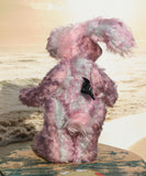 Clover Blossom is a very sweet and gentle, one of a kind rabbit in beautifully coloured mohair by Barbara Ann Bears Clover Blossom stands 9.5 inches( 24 cm) tall and is 7 inches (18cm) sitting, her ears are 8.5 inches (22 cm) across the top. Clover Blossom is a little sweetie, a beautifully coloured rabbit with a heart of gold.