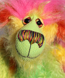 Cora B.Limey is wildly colourful and happy, one of a kind, hand dyed mohair, artist bear by Barbara-Ann Bears, a bear of tropical exuberance Cora B.Limey stands 14.5 inches( 37 cm) tall and is 11.5 inches (29 cm) sitting, this doesn't include her shock of hair which adds another 3 inches (7.5 cm) to those figures.