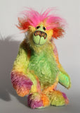 Cora B.Limey is wildly colourful and happy, one of a kind, hand dyed mohair, artist bear by Barbara-Ann Bears, a bear of tropical exuberance Cora B.Limey stands 14.5 inches( 37 cm) tall and is 11.5 inches (29 cm) sitting, this doesn't include her shock of hair which adds another 3 inches (7.5 cm) to those figures.