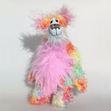 Cosmo is a gorgeous and gloriously colourful one of a kind artist bear in stunning hand dyed mohair and faux fur by Barbara-Ann Bears, she stands 16.5 inches( 42 cm) tall and is 12 inches ( 30 cm) sitting. Cosmo is mostly made from a long, wild mohair in colourful bands of blue, green, orange, gold, magenta and lime