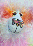Cosmo is a gorgeous and gloriously colourful one of a kind artist bear in stunning hand dyed mohair and faux fur by Barbara-Ann Bears, she stands 16.5 inches( 42 cm) tall and is 12 inches ( 30 cm) sitting. Cosmo is mostly made from a long, wild mohair in colourful bands of blue, green, orange, gold, magenta and lime