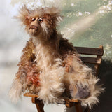 Crackerjack is a magnificent, charming and elegant, one of a kind, artist bear by Barbara-Ann Bears in luxurious hand-dyed fluffy mohair. He's 25 inches(64 cm) tall from his toes to his head and is 18 inches(46 cm) sitting from his bottom to his head, he has flexible knees and bent legs so he sits rather elegantly.