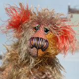 Cromarty is a wild, scraggly, scruffy bear, a one of a kind artist teddy bear in beautiful hand dyed mohair by Barbara-Ann Bears Cromarty stands 8.5 inches(24 cm) tall and is 7 inches (18 cm) sitting. Cromarty is a wild and shaggy chap, like a bearded collie he finds it very hard to keep the fur out of his eyes