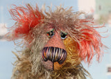 Cromarty is a wild, scraggly, scruffy bear, a one of a kind artist teddy bear in beautiful hand dyed mohair by Barbara-Ann Bears Cromarty stands 8.5 inches(24 cm) tall and is 7 inches (18 cm) sitting. Cromarty is a wild and shaggy chap, like a bearded collie he finds it very hard to keep the fur out of his eyes