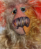 Cromarty is a wild, scraggly, scruffy bear, a one of a kind artist teddy bear in beautiful hand dyed mohair by Barbara-Ann Bears Cromarty stands 8.5 inches(24 cm) tall and is 7 inches (18 cm) sitting. Cromarty is a wild and shaggy chap, like a bearded collie he finds it very hard to keep the fur out of his eyes