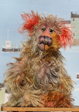 Cromarty is a wild, scraggly, scruffy bear, a one of a kind artist teddy bear in beautiful hand dyed mohair by Barbara-Ann Bears Cromarty stands 8.5 inches(24 cm) tall and is 7 inches (18 cm) sitting. Cromarty is a wild and shaggy chap, like a bearded collie he finds it very hard to keep the fur out of his eyes