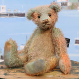 Cyril is a very handsome & subtly colourful, traditional, one of a kind artist teddy bear, in hand dyed mohair by Barbara Ann Bears, he stands 8.5 inches (21 cm) tall and is 6 inches (15 cm) sitting. Cyril is made from a fairly short and sparse German mohair hand-dyed in natural hues of jade, turquoise and a soft peach