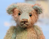 Cyril is a very handsome & subtly colourful, traditional, one of a kind artist teddy bear, in hand dyed mohair by Barbara Ann Bears, he stands 8.5 inches (21 cm) tall and is 6 inches (15 cm) sitting. Cyril is made from a fairly short and sparse German mohair hand-dyed in natural hues of jade, turquoise and a soft peach