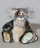 Danny Dalrymple is a very sweet and happy one of a kind, mohair artist bear by Barbara-Ann Bears, he stands 8 inches/20cm tall and is 6.5 inches/17 cm sitting. Danny Dalrymple's main mohair is a very rare, almost vintage, medium length, slightly wavy German mohair that is dark brown with tipping in white and then blue