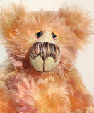 Daphne is made from a very long and luscious, straight pile mohair that Barbara has dyed in subtle blends of dusky fawn, peach and lilac. Daphne has hand dyed velvet paw pads which complement her colouring perfectly.  Daphne has large, beautiful, hand painted glass eyes with hand coloured, a wonderfully large nose embroidered from individual threads to match her colouring and a charming smile, she is stuffed with plastic pellets and polyester stuffing to make her a little heavier and more cuddly.