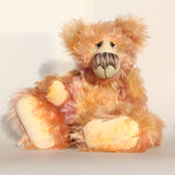 Daphne, a gently romantic and artistic, one of a kind artist bear in gently coloured hand dyed mohair by Barbara Ann Bears, she stands 16 inches/41 cm tall and is 12 inches/31 cm sitting. Daphne is made from a long and luscious, straight pile mohair that Barbara has dyed in subtle blends of dusky fawn, peach and lilac