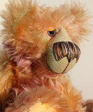 Daphne is made from a very long and luscious, straight pile mohair that Barbara has dyed in subtle blends of dusky fawn, peach and lilac. Daphne has hand dyed velvet paw pads which complement her colouring perfectly.  Daphne has large, beautiful, hand painted glass eyes with hand coloured, a wonderfully large nose embroidered from individual threads to match her colouring and a charming smile, she is stuffed with plastic pellets and polyester stuffing to make her a little heavier and more cuddly.