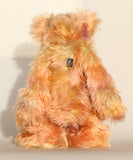 Daphne is made from a very long and luscious, straight pile mohair that Barbara has dyed in subtle blends of dusky fawn, peach and lilac. Daphne has hand dyed velvet paw pads which complement her colouring perfectly.  Daphne has large, beautiful, hand painted glass eyes with hand coloured, a wonderfully large nose embroidered from individual threads to match her colouring and a charming smile, she is stuffed with plastic pellets and polyester stuffing to make her a little heavier and more cuddly.