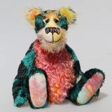 Darcy Dingle is a wild and wonderful bear, full of colourful happiness, a one of a kind, mohair artist teddy bear by Barbara-Ann Bears Darcy Dingle stands 10 inches( 25 cm) tall and is 8 inches ( 20 cm) sitting.