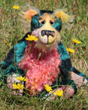 Darcy Dingle is a wild and wonderful bear, full of colourful happiness, a one of a kind, mohair artist teddy bear by Barbara-Ann Bears. Darcy is a very happy bear, he loves to be out in the garden smelling the flowers and just enjoying the fresh air and warm sunshine