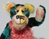 Darcy Dingle has beautiful, hand painted glass eyes with hand coloured eyelids, a splendid nose embroidered from individual threads to compliment his colouring and he has a huge, friendly smile. Darcy Dingle is the happiest of teddy bears, a bear who wants to brighten every dark corner and bring smiles and laughter wherever he goes