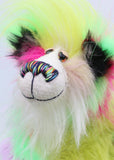 Dazzling Dave is a flamboyant fun-loving and comical, one of a kind, artist bear by Barbara-Ann Bears, he stands 13 inches/33 cm tall and is 10.5 inches/27 cm sitting. He is made of bright lime, pink, yellow and lavender faux fur, with lime paw pads, hand painted eyes, a beautiful multi coloured nose and a sweet smile