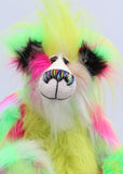 Dazzling Dave is a flamboyant fun-loving and comical, one of a kind, artist bear by Barbara-Ann Bears, he stands 13 inches/33 cm tall and is 10.5 inches/27 cm sitting. He is made of bright lime, pink, yellow and lavender faux fur, with lime paw pads, hand painted eyes, a beautiful multi coloured nose and a sweet smile