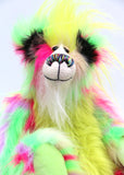 Dazzling Dave is a flamboyant fun-loving and comical, one of a kind, artist bear by Barbara-Ann Bears, he stands 13 inches/33 cm tall and is 10.5 inches/27 cm sitting. He is made of bright lime, pink, yellow and lavender faux fur, with lime paw pads, hand painted eyes, a beautiful multi coloured nose and a sweet smile
