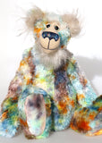 Elgar, a calm and handsome, one of a kind, hand dyed mohair, artist teddy bear by Barbara-Ann Bears, he stands 16.5 inches/42 cm tall and is 13 inches/33 cm sitting. A bear like springtime, with blue skies, the first bright greens, some amber and gold flowers and just a few dark clouds to bring some sharp brief showers.