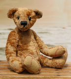 Eustace is a very lovable and sweet, one of a kind, traditional artist teddy bear made from gorgeous vintage mohair by Barbara-Ann Bears. Eustace stands 8 inches (20 cm) tall and is 6 inches (15 cm) sitting. Eustace is made from beige vintage German mohair with a faint design in red, with boot button eyes
