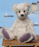 Fairbrother is a sweet and gentle, one of a kind, traditional artist teddy bear made from beautiful German mohair, by Barbara-Ann Bears Fairbrother stands 12 inches (30cm) tall and is 9 inches (23cm) sitting Fairbrother is made from beautiful, slightly wavy, silver German mohair which has a hint of lilac in the backing