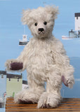 Fairbrother is a sweet and gentle, one of a kind, traditional artist teddy bear made from beautiful German mohair, by Barbara-Ann Bears Fairbrother stands 12 inches (30cm) tall and is 9 inches (23cm) sitting Fairbrother is made from beautiful, slightly wavy, silver German mohair which has a hint of lilac in the backing