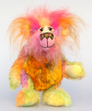 Wowzer is an extremely cheerful multi-coloured bear, a bear of beautiful, vivid, spicy colours