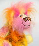 Wowzer is an extremely cheerful multi-coloured bear, a bear of beautiful, vivid, spicy colours