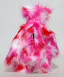Francisco is a gloriously pink, fun-loving and comical, one of a kind artist bear by Barbara-Ann Bears in luxurious mohair and rather wild faux fur, he stands 14.5 inches/37 cm tall. Francisco is made from long, fluffy faux fur with patches of magenta, baby pink, scarlet and white, coupled with a long white mohair.
