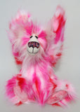 Francisco is a gloriously pink, fun-loving and comical, one of a kind artist bear by Barbara-Ann Bears in luxurious mohair and rather wild faux fur, he stands 14.5 inches/37 cm tall. Francisco is made from long, fluffy faux fur with patches of magenta, baby pink, scarlet and white, coupled with a long white mohair.