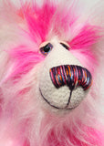 Francisco is made from long, fluffy faux fur with patches of magenta, baby pink, scarlet and white, coupled with a long white mohair. Francisco has beautiful hand painted glass eyes with eyelids, a wonderfully embroidered nose, sewn from individual threads to match his colouring and he has a huge beaming smile