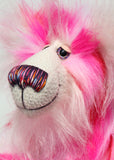 Francisco is made from long, fluffy faux fur with patches of magenta, baby pink, scarlet and white, coupled with a long white mohair. Francisco has beautiful hand painted glass eyes with eyelids, a wonderfully embroidered nose, sewn from individual threads to match his colouring and he has a huge beaming smile