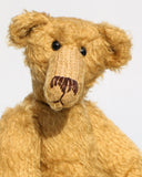 Hank PRINTED jointed mohair teddy bear sewing pattern to make a quirky Barbara-Ann Bear, with a long nose, big belly, long hands and feet. The Hank Teddy Bear pattern makes a curious, old-fashioned Barbara-Ann Bear, with a long nose