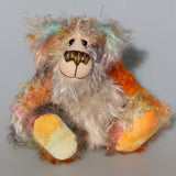 Herbie is a sweet and beautifully coloured one of a kind teddy bear in hand dyed mohair by Barbara-Ann Bears, he stands 10 inches/25 cm tall and is 7.5 inches/19 cm sitting.  Herbie is made from the most gorgeous mohairs, mainly a fairly long tousled mohair hand-dyed in a subtle blend of natural colours