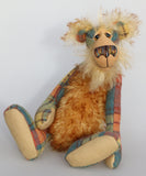 Howard Huckleford is an engagingly eccentric one of a kind artist bear in elegant tweed and wildly fluffy tipped mohair by Barbara Ann Bears He stands 14.5 inches( 37 cm) tall and is 11 inches (28 cm) sitting. Howard Huckleford is made from a beautifully coloured Harris Tweed and long, fluffy brown tipped blonde mohair