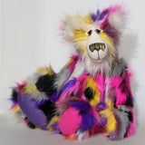 Miguel is a big, heavy bear he's very happy and colourful yet with a very dignified and relaxed manner. A gentle bear always ready for a little (or a lot of) hugging. He has a charming expression, you can sense that he wants you to be happy and he'll try his best to ensure that you are, he'll listen to you talk about anything that might have upset you and although he can't talk you know that he's always on your side.