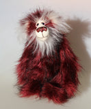 Molly Cuddle a sweet and gentle one of a kind artist bear in stunning burgundy coloured faux fur and gorgeous long fluffy white mohair by Barbara-Ann Bears, she stands 10 inches/25 cm tall and is 7.5 inches/19 cm sitting. Molly Cuddle has beautiful, hand painted eyes with eyelids, a splendid nose embroidered from individual threads and a sweet, friendly smile