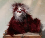 Molly Cuddle a sweet and gentle one of a kind artist bear in stunning burgundy coloured faux fur and gorgeous long fluffy white mohair by Barbara-Ann Bears, she stands 10 inches/25 cm tall and is 7.5 inches/19 cm sitting. Molly Cuddle has beautiful, hand painted eyes with eyelids, a splendid nose embroidered from individual threads and a sweet, friendly smile