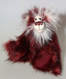 Molly Cuddle a sweet and gentle one of a kind artist bear in stunning burgundy coloured faux fur and gorgeous long fluffy white mohair by Barbara-Ann Bears, she stands 10 inches/25 cm tall and is 7.5 inches/19 cm sitting. Molly Cuddle has beautiful, hand painted eyes with eyelids, a splendid nose embroidered from individual threads and a sweet, friendly smile