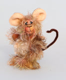 Mouseterpiece is mostly made from a fairly long (very long on a little mouse), feathery sparse mohair that Barbara has dyed in soft browns and his tummy is a denser, curly mohair dyed in shades of beige and blonde. His face is made from a longer mohair dyed in a soft shade of terracotta. The fronts of his ginormous ears are made from a warm beige German wool felt, and the backs a dusky brown.