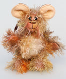Mouseterpiece is mostly made from a fairly long (very long on a little mouse), feathery sparse mohair that Barbara has dyed in soft browns and his tummy is a denser, curly mohair dyed in shades of beige and blonde. His face is made from a longer mohair dyed in a soft shade of terracotta. The fronts of his ginormous ears are made from a warm beige German wool felt, and the backs a dusky brown.
