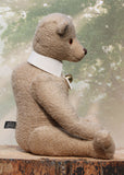 Pomeroy a large and elegant classical, one of a kind, traditional mohair artist teddy bear by Barbara Ann Bears. He stands 23.5 inches (60 cm) tall and is made from gorgeous dense and curly beige mohair with beige suedette paw pads, old amber glass eyes, an impressive embroidered brown nose and the sweetest smile