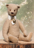Pomeroy a large and elegant classical, one of a kind, traditional mohair artist teddy bear by Barbara Ann Bears. He stands 23.5 inches (60 cm) tall and is made from gorgeous dense and curly beige mohair with beige suedette paw pads, old amber glass eyes, an impressive embroidered brown nose and the sweetest smile